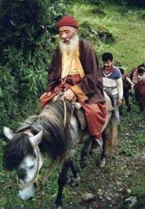 Chatral Rinpoche on horseback